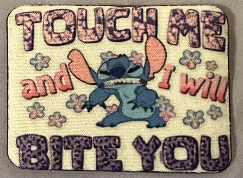 TOUCH ME AND I WILL BITE YOU
