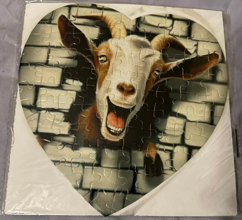 LAUGHING GOAT