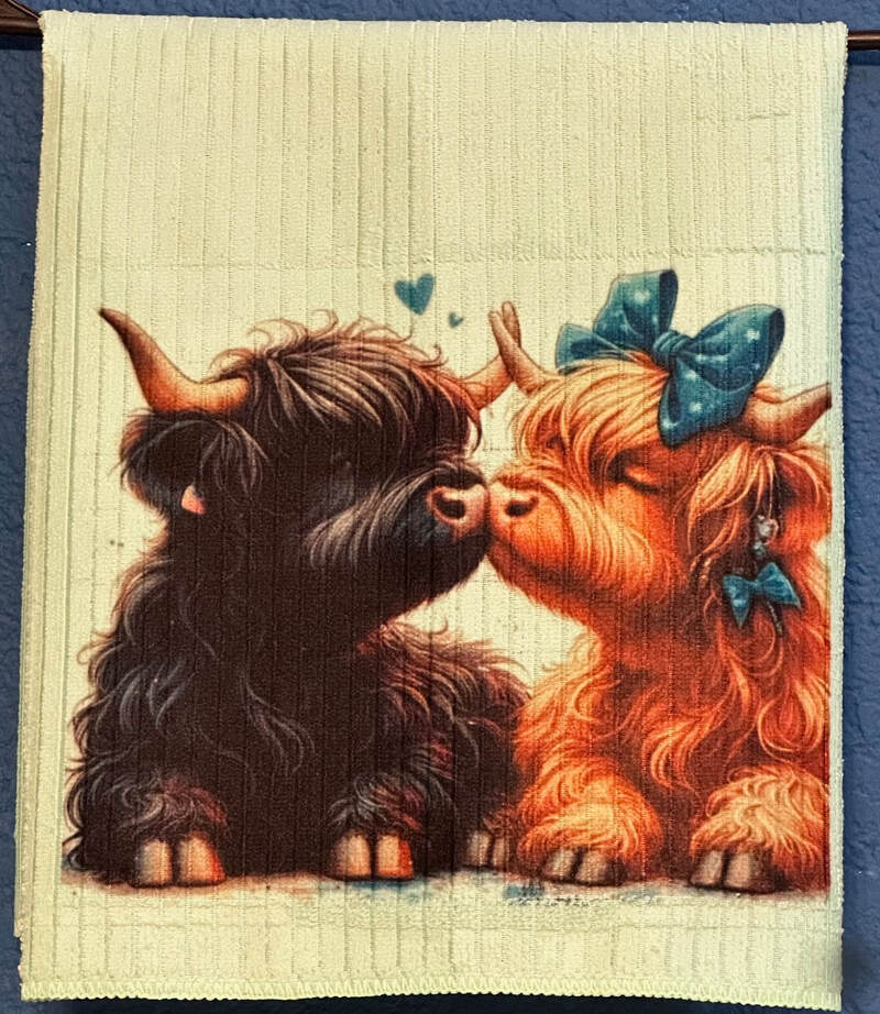 KISSING COWS