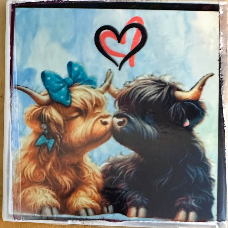 KISSING COWS